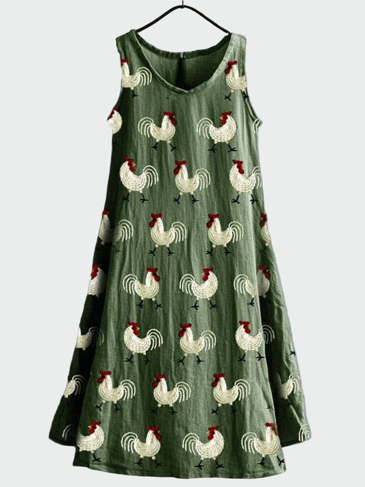 Grünes Kleid mit Hühnermuster